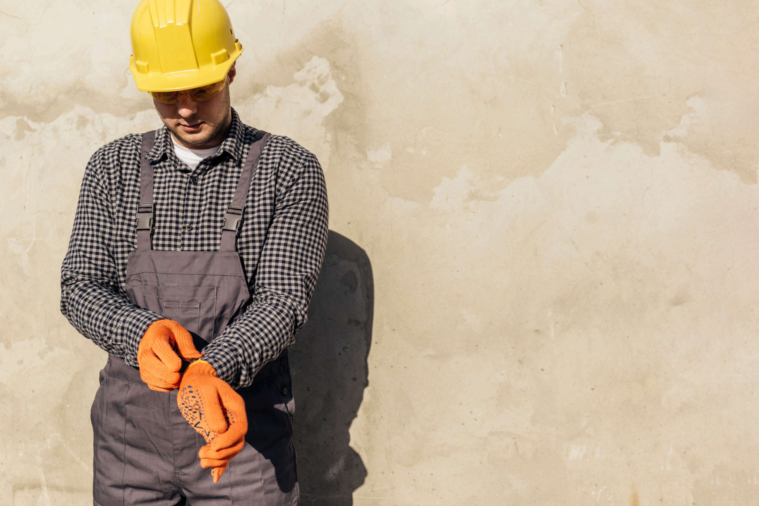 front-view-worker-with-hard-hat-copy-space